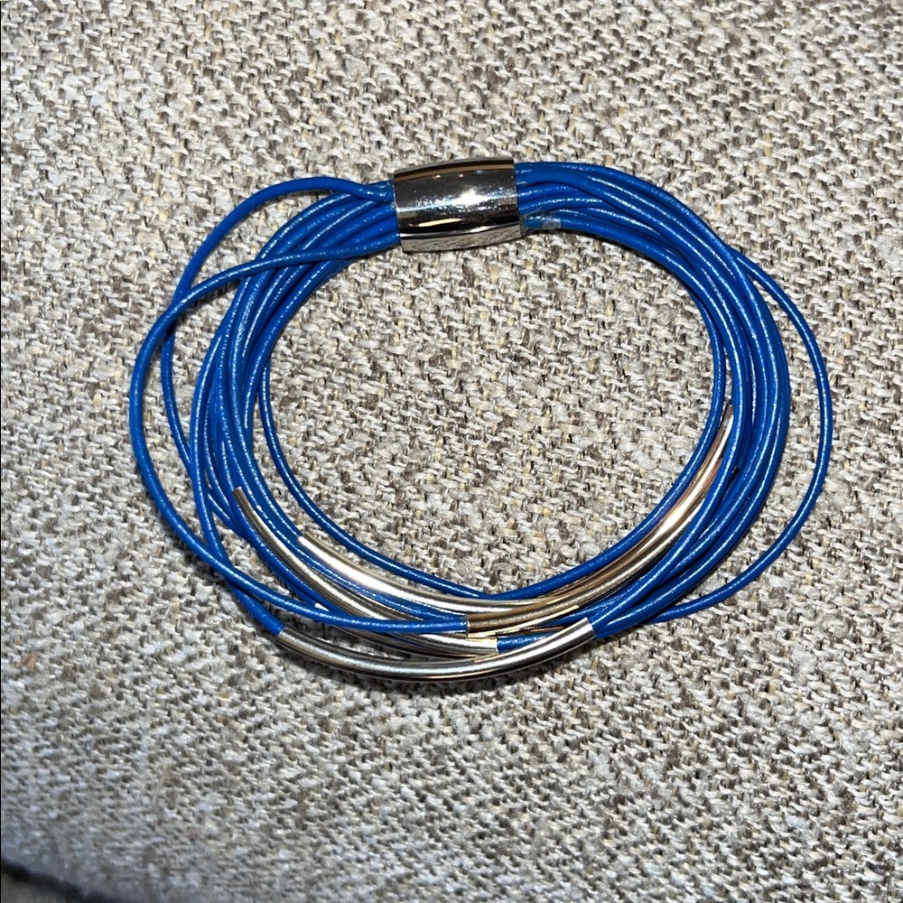Bracelet with metal skinny stations .